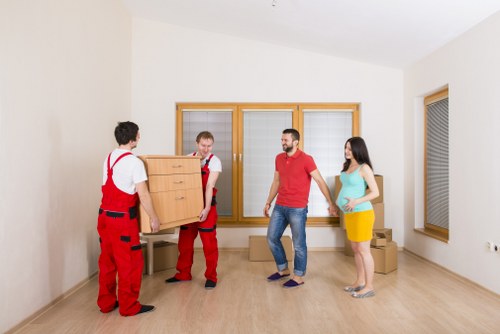 Local moving truck loading boxes and furniture in Hamptonhill