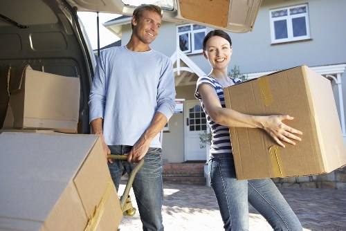 Careful unloading of household items into a new home