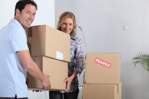 Professional removalists loading furniture for a local relocation