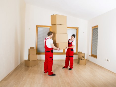 Packed boxes and furniture loaded for removal truck hire